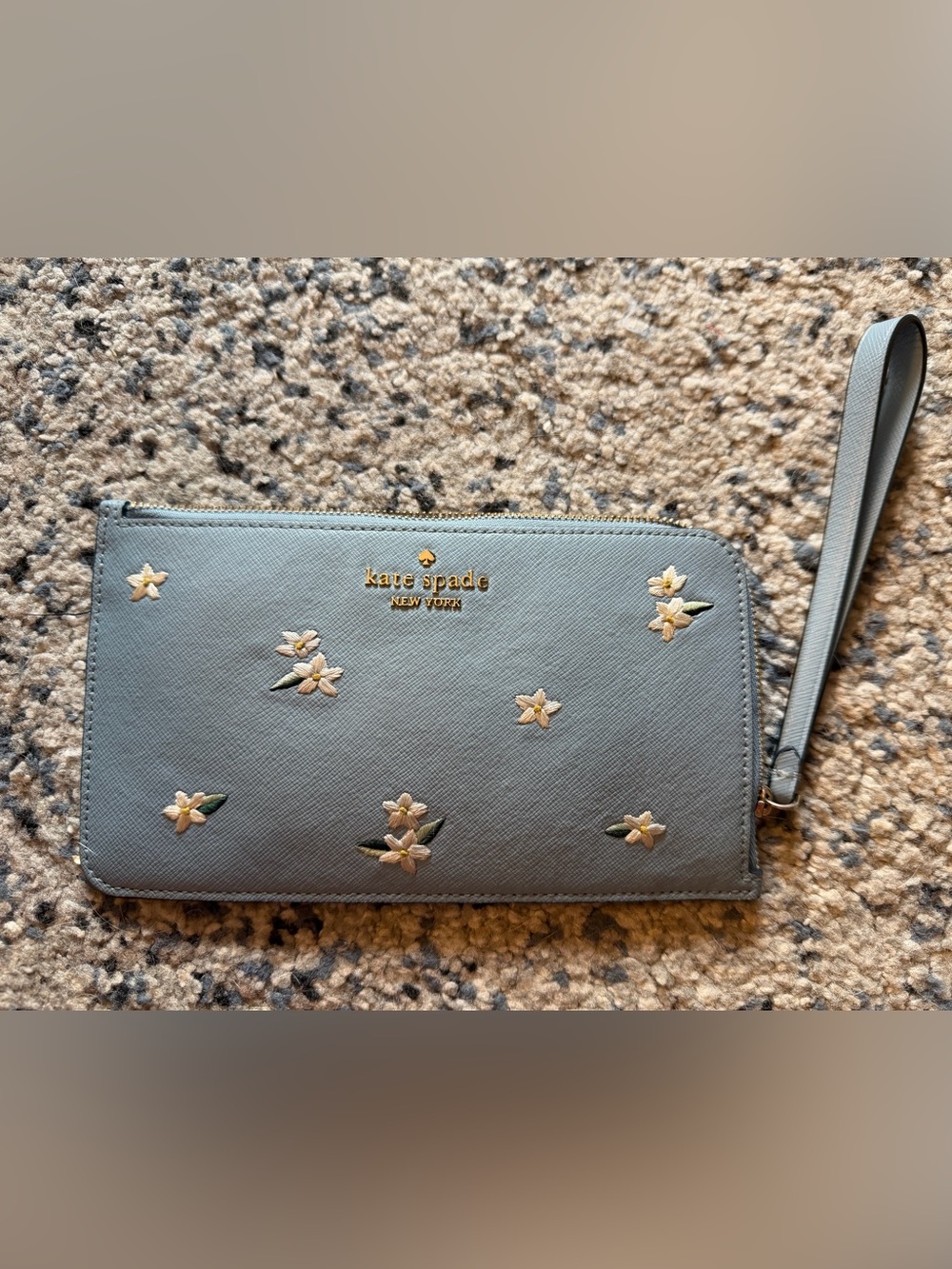 kate spade light blue floral zip-around wallet with gold logo